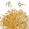 A pile of gold-colored metal eye pins for jewelry making and DIY crafts, showing various sizes and styles.