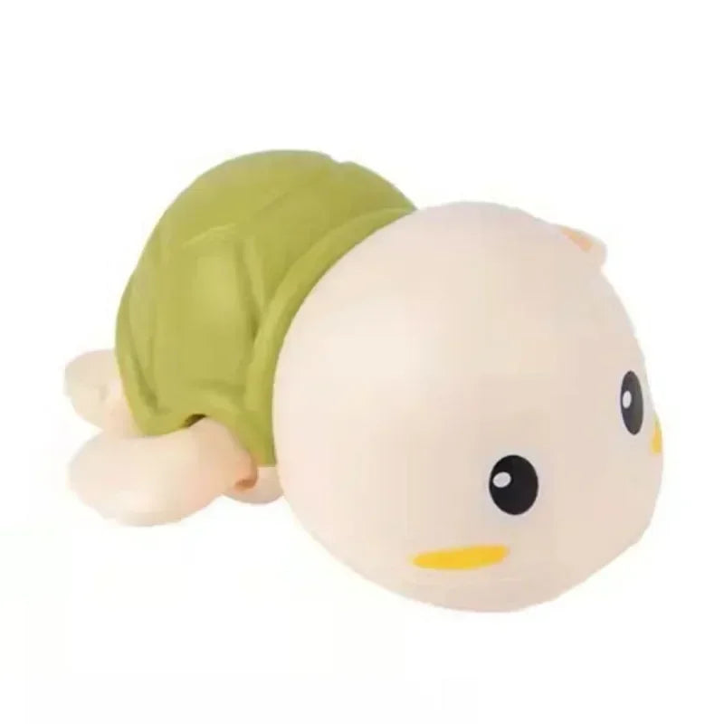 A light green wind-up swimming duck bath toy for toddlers.