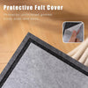 A protective felt cover is shown on a puzzle board, demonstrating its use to shield the game from dust and pets.