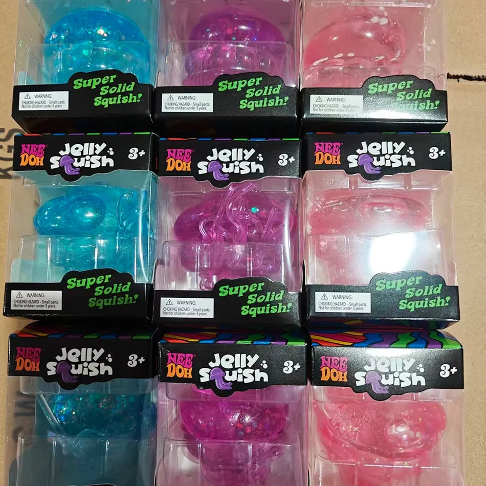 A collection of colorful squishy toys including Jellyfish Squish and Super Solid Squish in various shades.