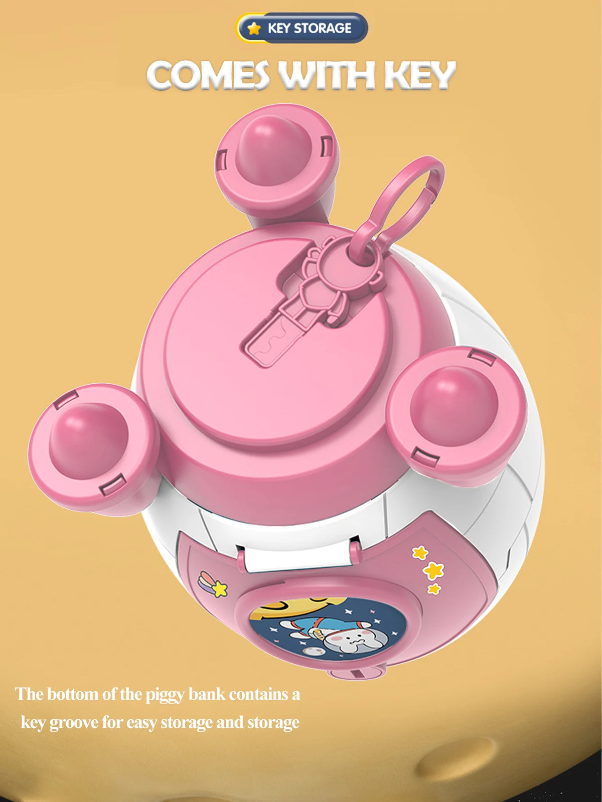 Pink rocket spacecraft piggy bank with a key lock and storage groove