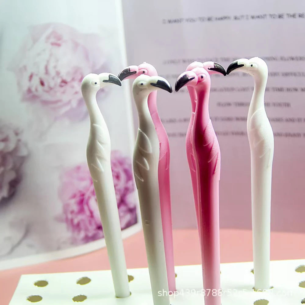 Three pink and white toucan-shaped diamond painting tools displayed on a white surface.