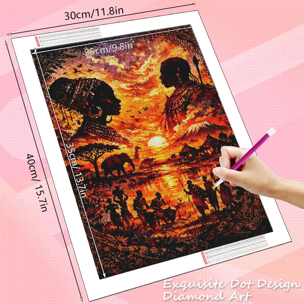 A diamond painting kit featuring a sunset portrait of figures silhouetted against a bright orange and yellow sky.