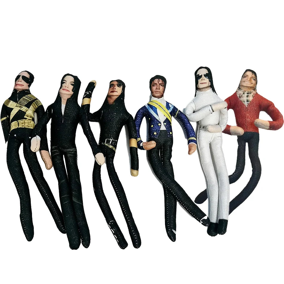 A collection of poseable plush dolls resembling Michael Jackson with bendable limbs.