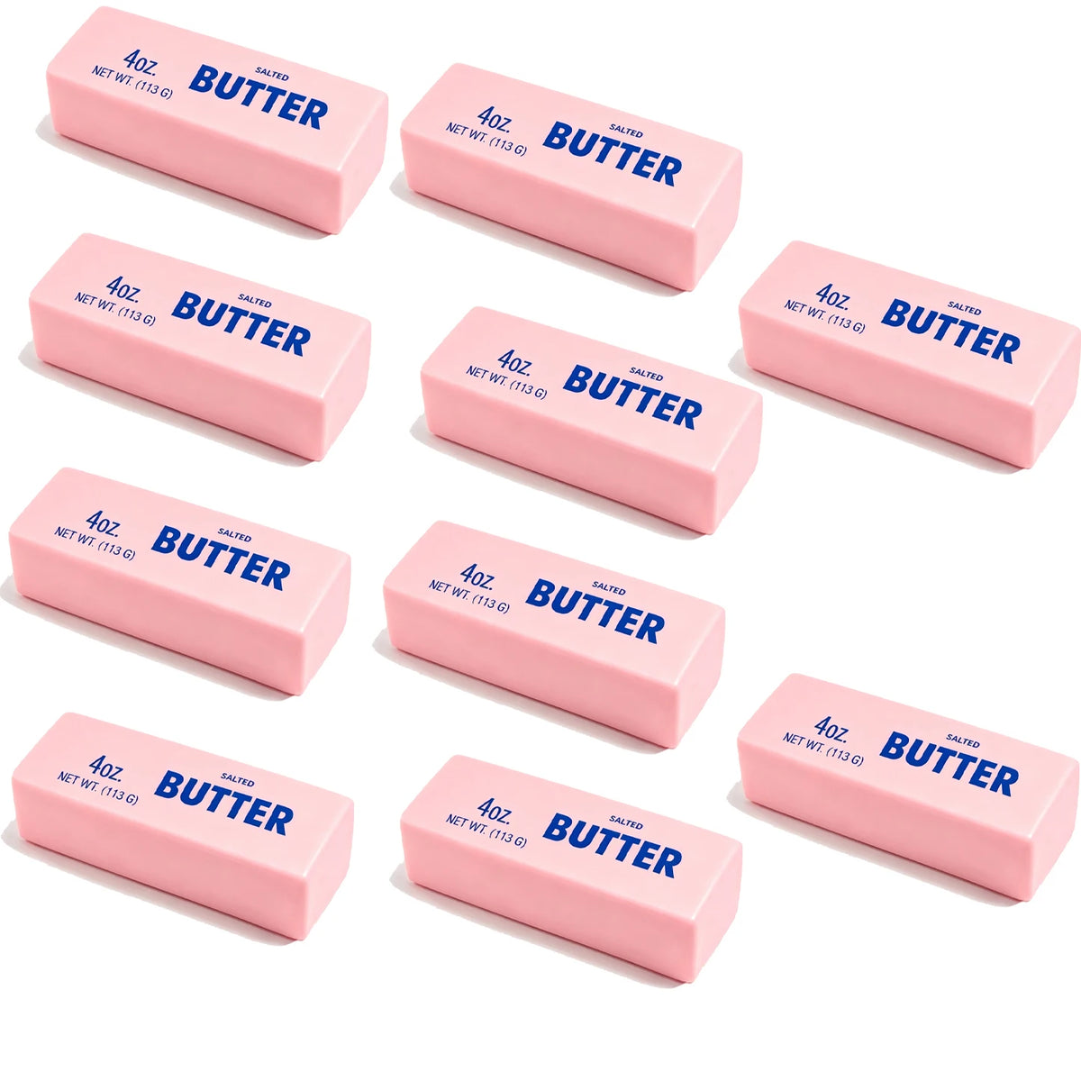 A collection of pink butter stick squishy toys in various sizes and packaging.