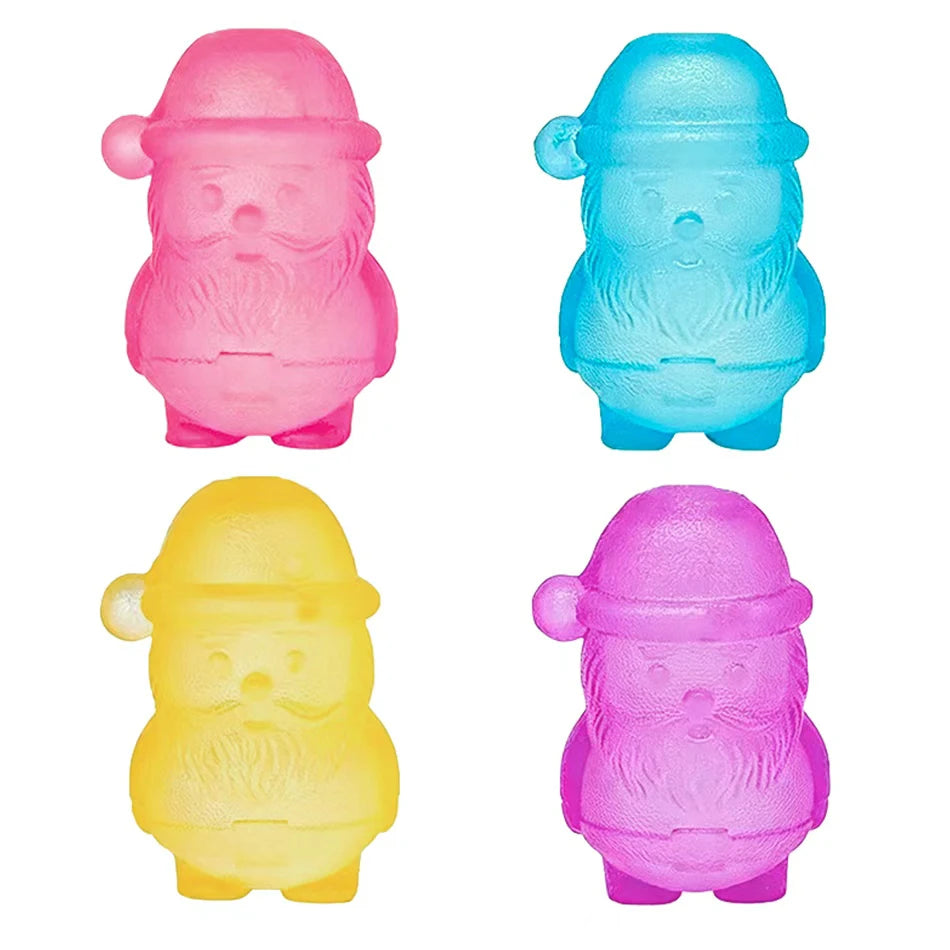 A collection of five squishy stress relief toys shaped like Santa figures in pink, blue, yellow, and purple.