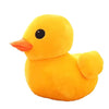 A bright yellow plush toy shaped like a duck, soft and cuddly.