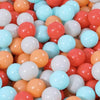 A close-up view of a large pack of colorful plastic balls in various shades of orange, pink, white, and light blue.