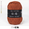 A ball of reddish-brown milk cotton yarn labeled 77# 红如 for knitting and crochet.