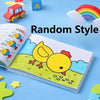 A colorful doodle coloring book lying open on a blue surface with toys and a rainbow in the background.