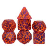 A set of seven faceted polyhedral dice made of translucent purple resin with bright orange inclusions.