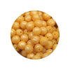 A pile of yellow silicone beads for DIY jewelry making in assorted sizes.