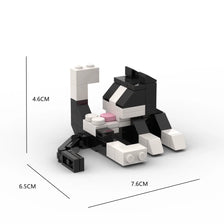A 62-piece animal building blocks set featuring a black and white striped cat figure.