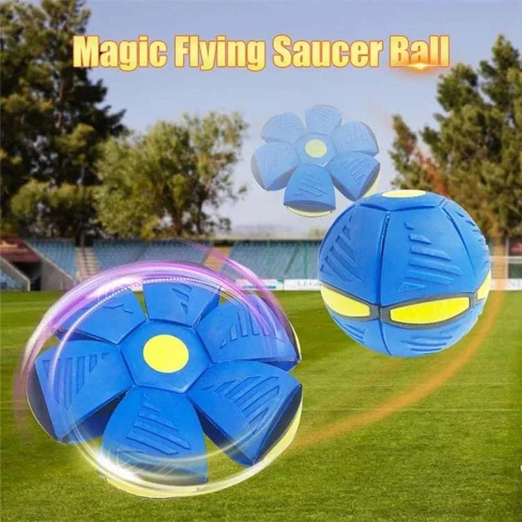 A blue magic flying saucer ball toy is shown floating above green grass.
