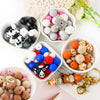 A collection of colorful cartoon animal silicone beads and gold jewelry findings for DIY crafting