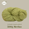 A ball of light green merino wool yarn labeled LIRISNLY