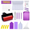 A purple diamond painting tool kit showing a tray, pens, tweezers, and various tools like a spatula and diamond shapes.