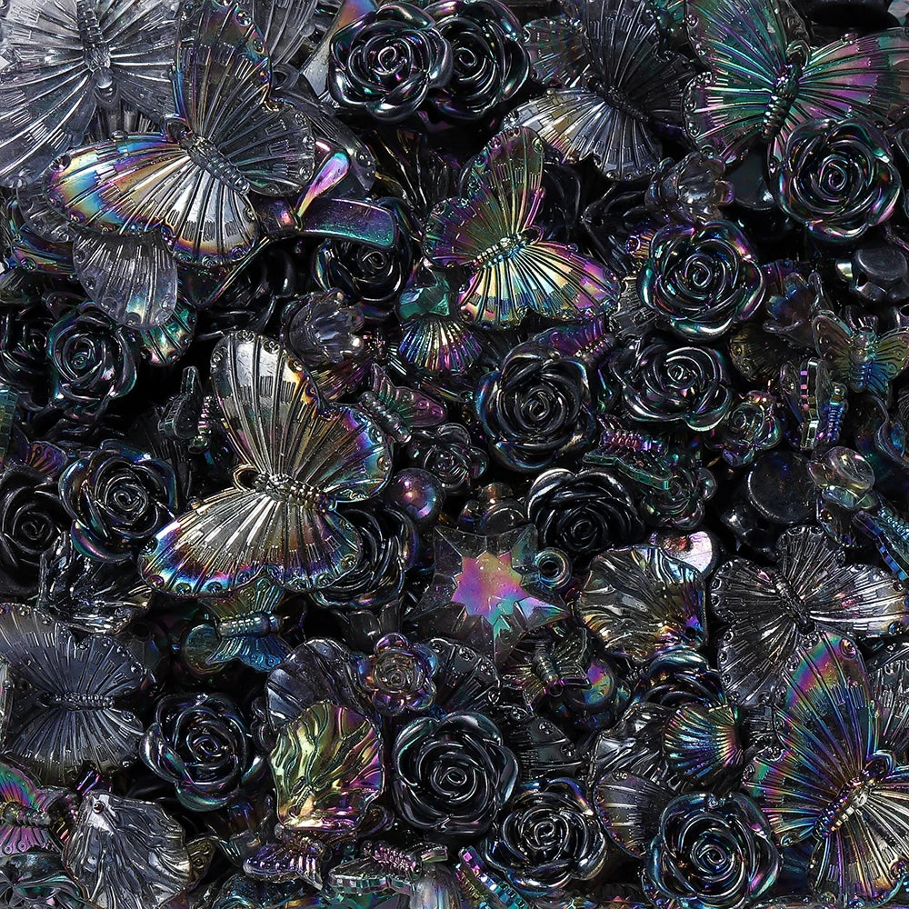 A close-up of iridescent, colorful butterfly shell acrylic beads used for DIY jewelry making.