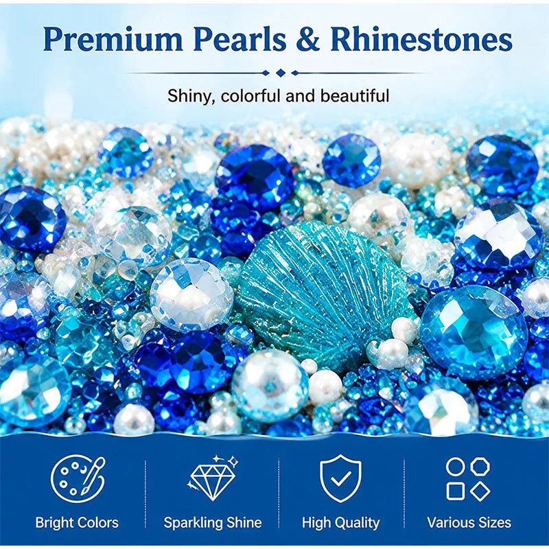 A collection of shiny, colorful pearls and rhinestones in blue and white shades.