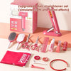 A pink hair straightener set for kids including various styling tools like combs, scissors, and brushes.