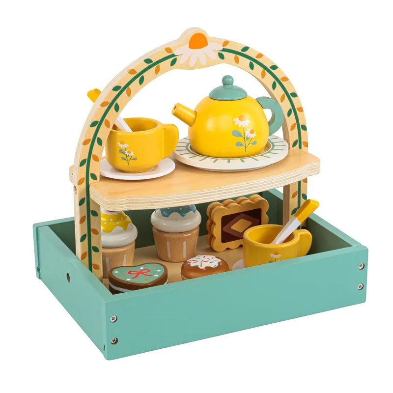 A wooden pretend play kitchen set featuring a yellow teapot, cups, and tea accessories displayed in a wooden arch frame.