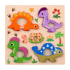 A wooden puzzle set featuring various dinosaur and reptile shapes in vibrant colors like orange, purple, green, and yellow.