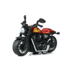 A vintage-style pull-back motorcycle toy car with a black frame and red body is shown.