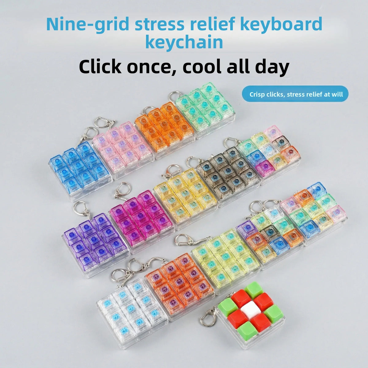 Nine-grid stress relief keyboard keychain featuring colorful LED keycaps and a red fidget cube.