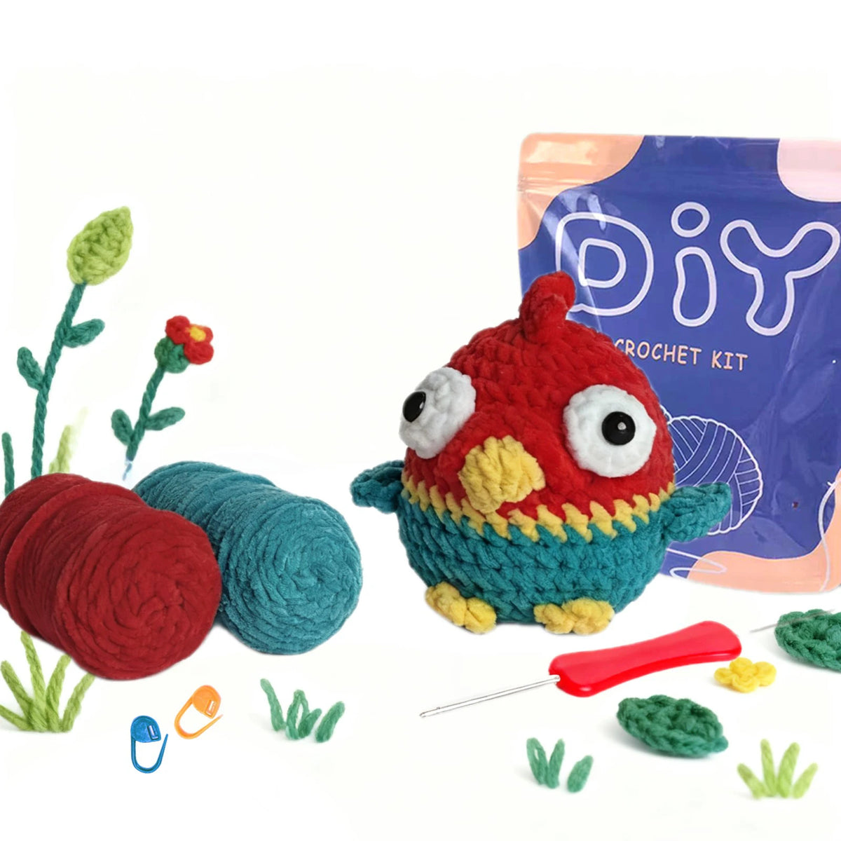 A DIY crochet kit for a bird featuring yarn, needles, and a finished crocheted bird toy.