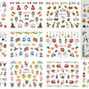 A collection of Christmas water transfer nail art stickers featuring festive designs like Santa, reindeer, ornaments, and hol