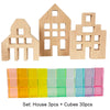 A set of wooden house building blocks and colorful acrylic cubes for creative play