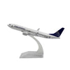 A diecast model of a Copa Airlines Boeing airplane mounted on a clear stand.