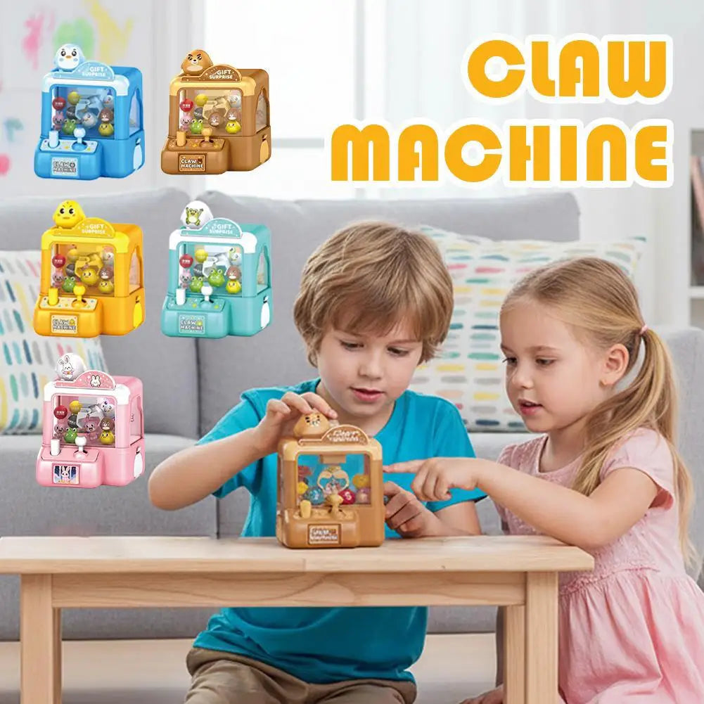 Two children playing with a portable claw machine toy featuring various figures and colorful components.