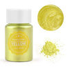 A glass jar of yellow pearl powder next to a circular swatch and loose powder.