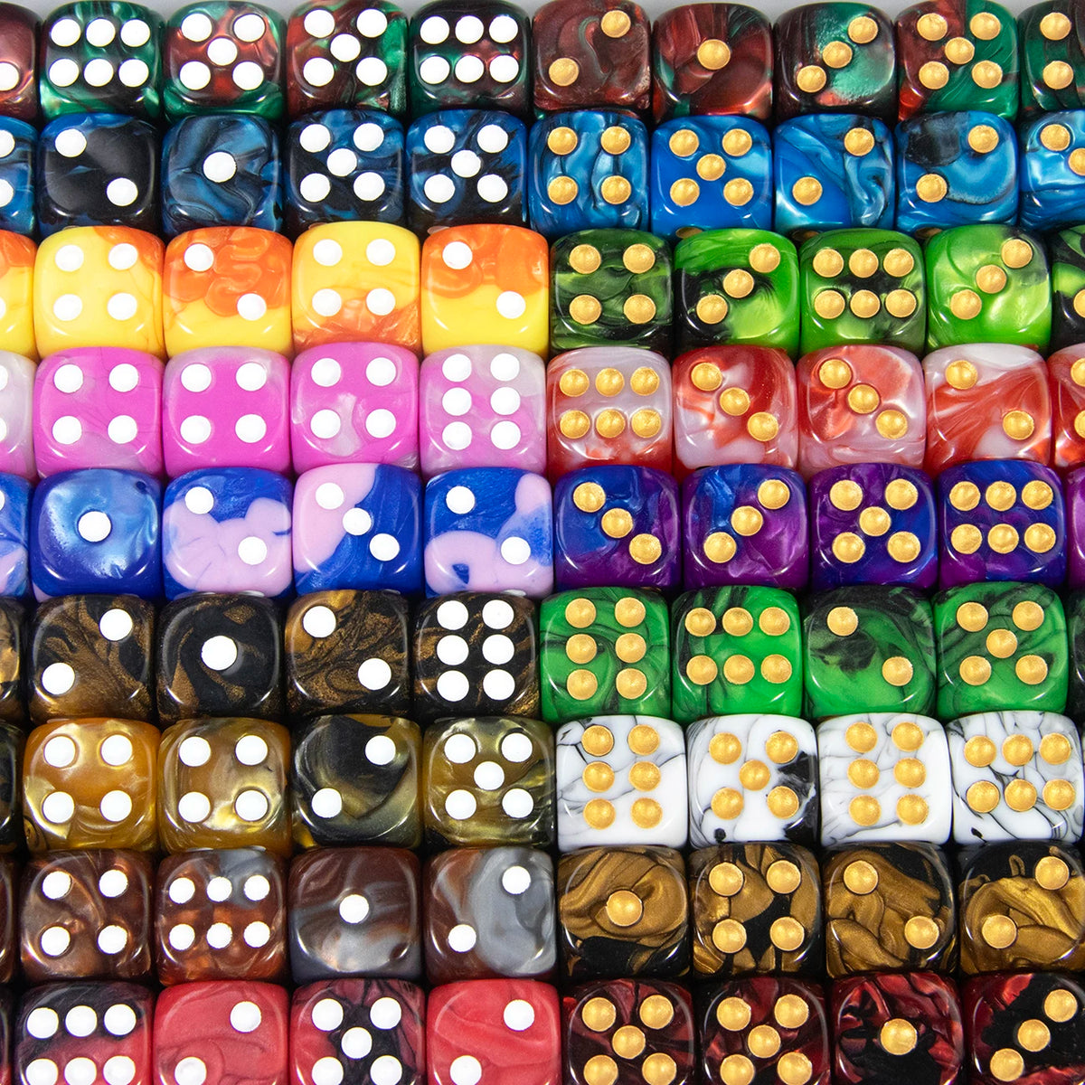 A collection of ten multi-colored acrylic D6 dice in various colors and patterns.