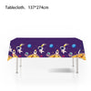 Purple tablecloth featuring outer space astronaut designs for party decor