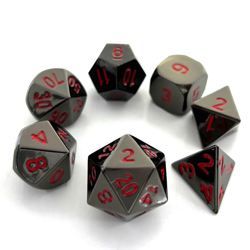 A set of ten premium metal polyhedral dice with a multicolor gold finish arranged in a circle.