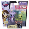 A set of three mini posable animal figures from Speedy Carver featuring a purple and yellow animal.