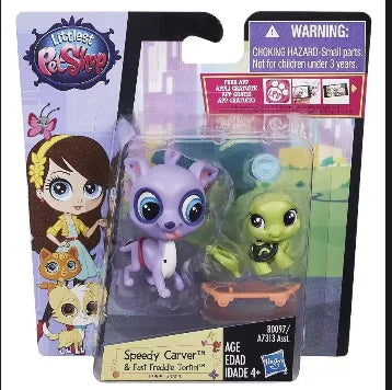 A set of three mini posable animal figures from Speedy Carver featuring a purple and yellow animal.