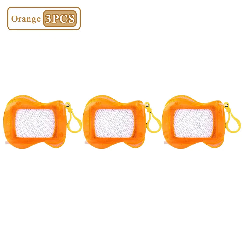 Three orange mini magnetic drawing board keychains with white grid surfaces and attached strings