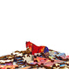 A collection of wooden 3D animal puzzle pieces, featuring a red horse and other animals.