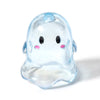 A translucent light blue acrylic ghost bead with black eyes and pink accents.