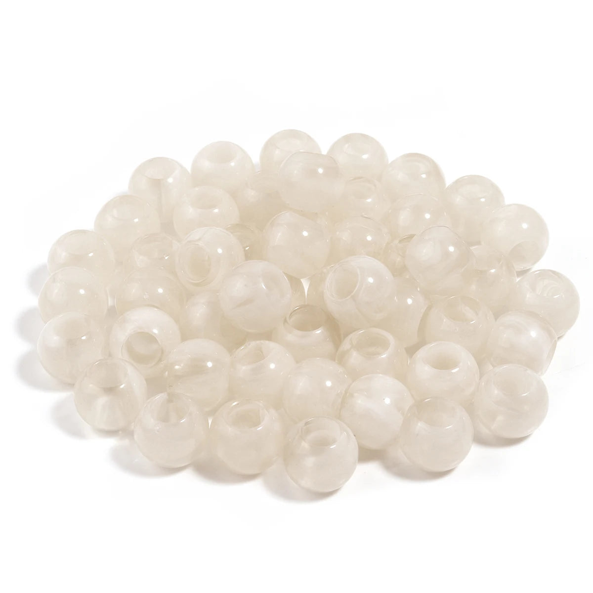 A pile of 50 imitation jade acrylic cloud beads used for jewelry making and DIY crafts.