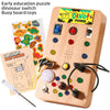 A wooden busy board toy featuring dinosaur switches and various colorful buttons for early education.
