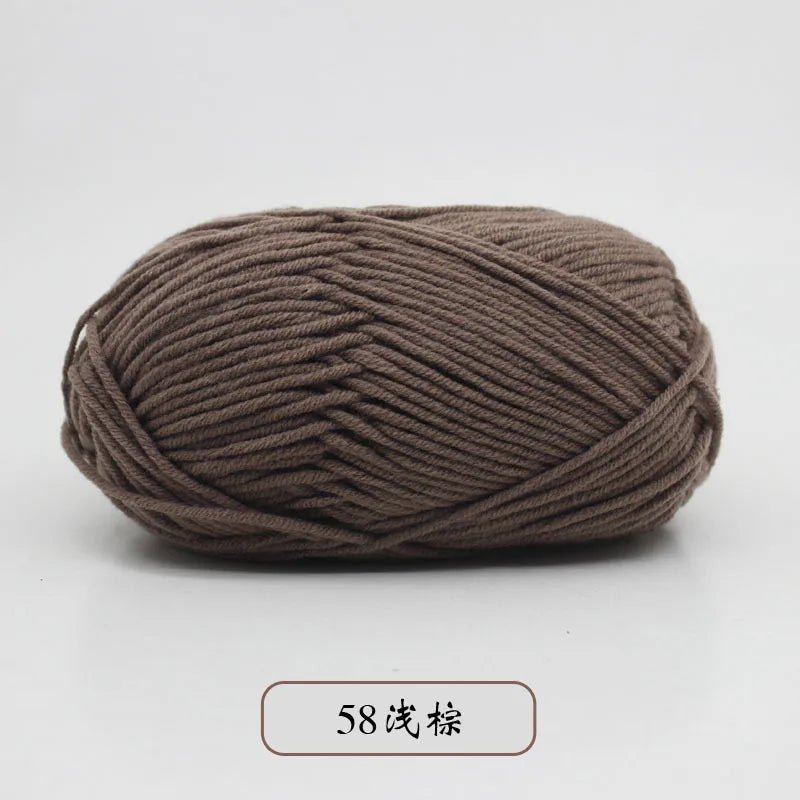 A ball of brown pre-dyed milk cotton yarn, 5-ply blended yarn for knitting and crochet.