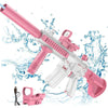 A pink electric battery-powered water gun with a detachable bottle is shown spraying water against a blue background.