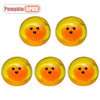 Five yellow pumpkin head squishy stress relief toys with orange faces