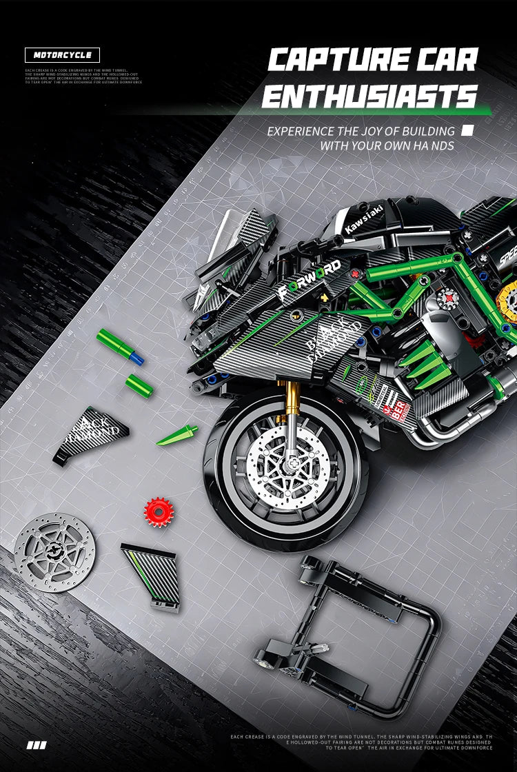 A detailed close-up of a Kawasaki motorcycle model kit and related parts laid out on a gray surface.