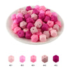 A pile of pink and magenta hexagonal silicone beads for DIY jewelry making, shown with numbered examples.