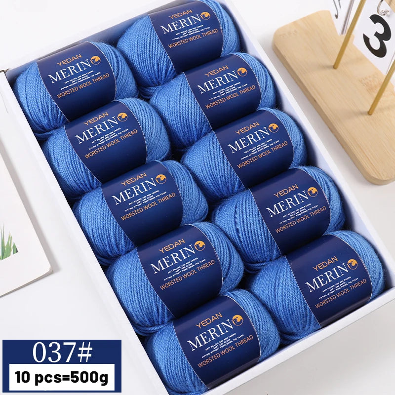 A box of YEDAN MERINO worsted wool thread yarn in blue, showing 10 pieces.